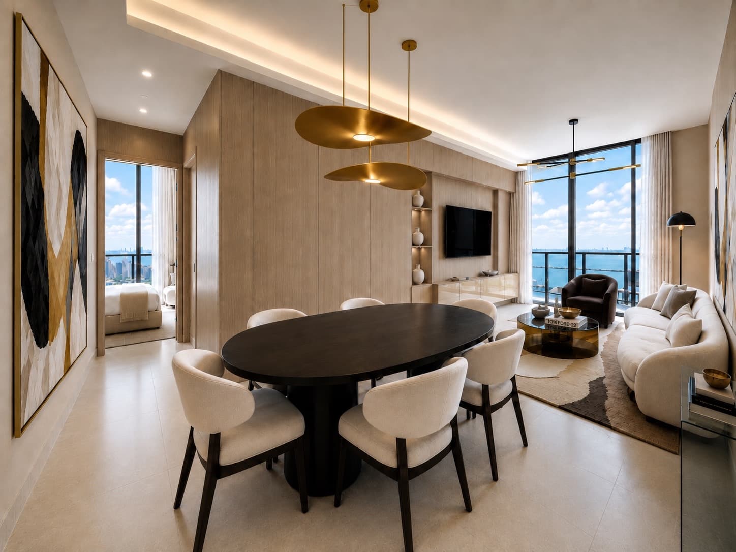 Open-plan living and dining room in a 51st-floor Miami penthouse with ocean and skyline views.