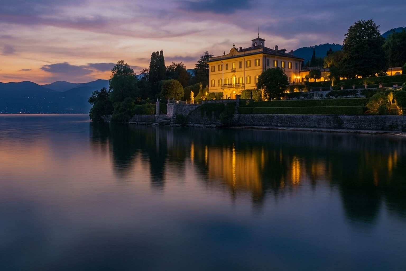 Lake Como property old villa at sunset overlooking Lake Como.